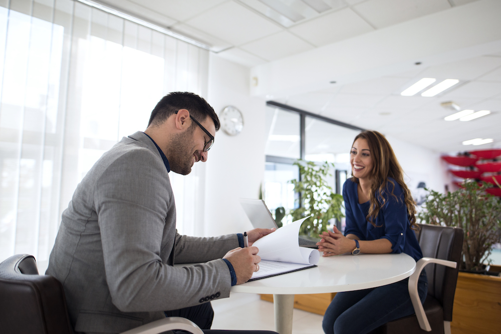At a job interview an employer asks an applicant about past change management certifications and change management experience that align with the job description.